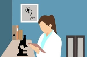 Vrouwelijke arts met microscoop - Gezondheidszorg | Groen Rechts